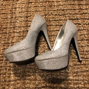 Silver jeweled pumps